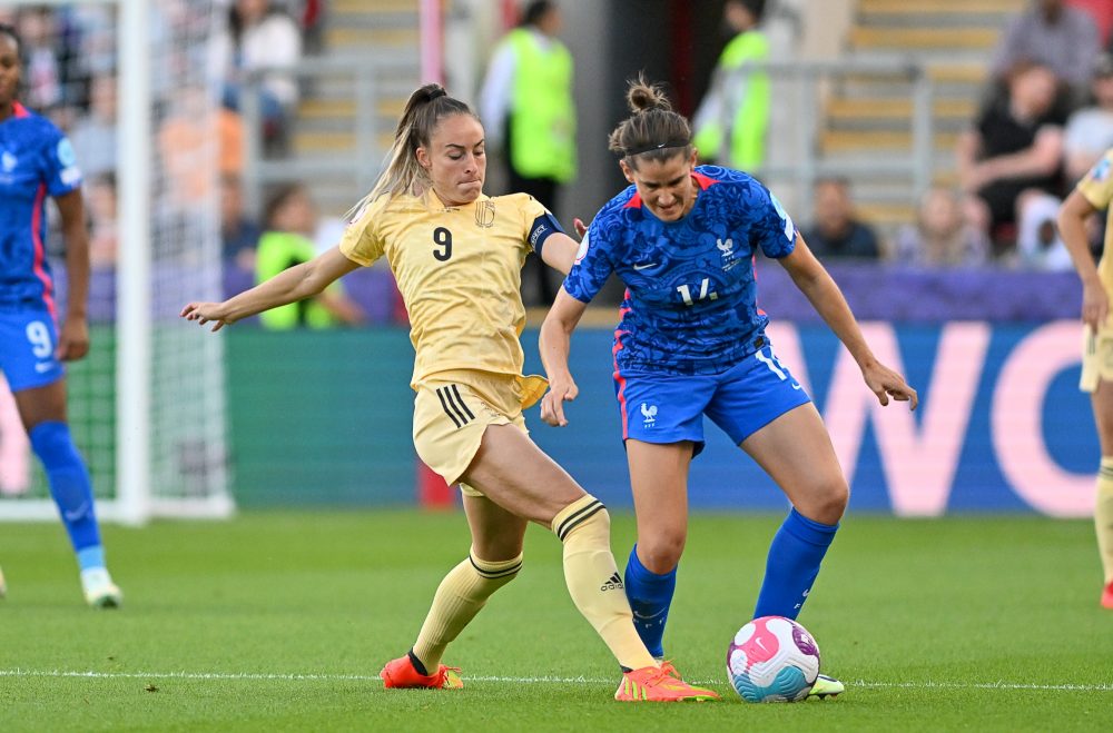 Belgium's Tessa Wullaert and France's Charlotte Bilbault fight for the ball during a game between Belgium's national women's soccer team the Red Flames and France, in Rotherham, England on Thursday 14 July 2022, second game in the group D at the Women's Euro 2022 tournament. The 2022 UEFA European Women's Football Championship is taking place from 6 to 31 July. BELGA PHOTO DAVID CATRY