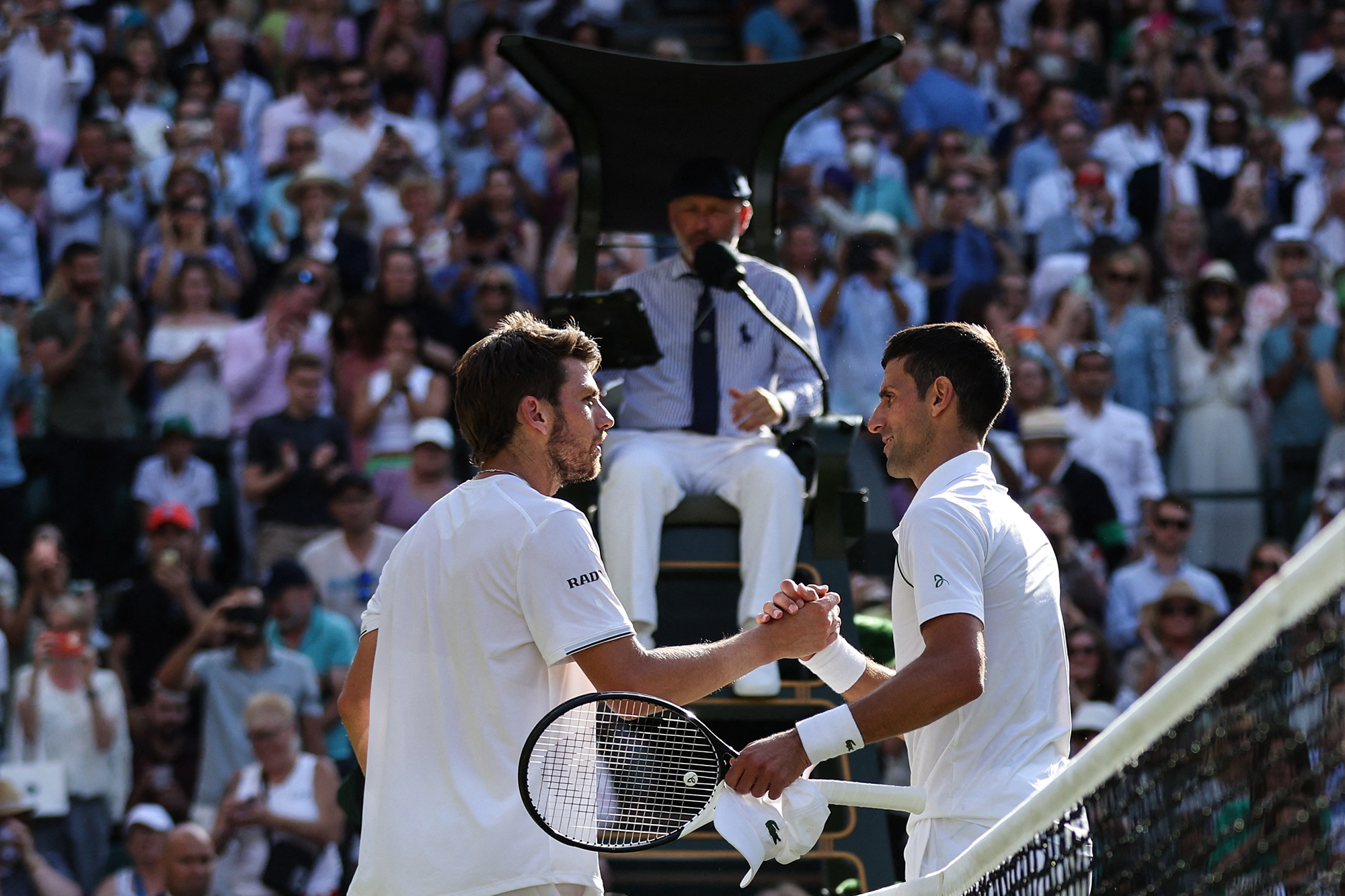 Cameron Norrie und Novak Djokovic (Bild: Adrian Dennis/AFP)