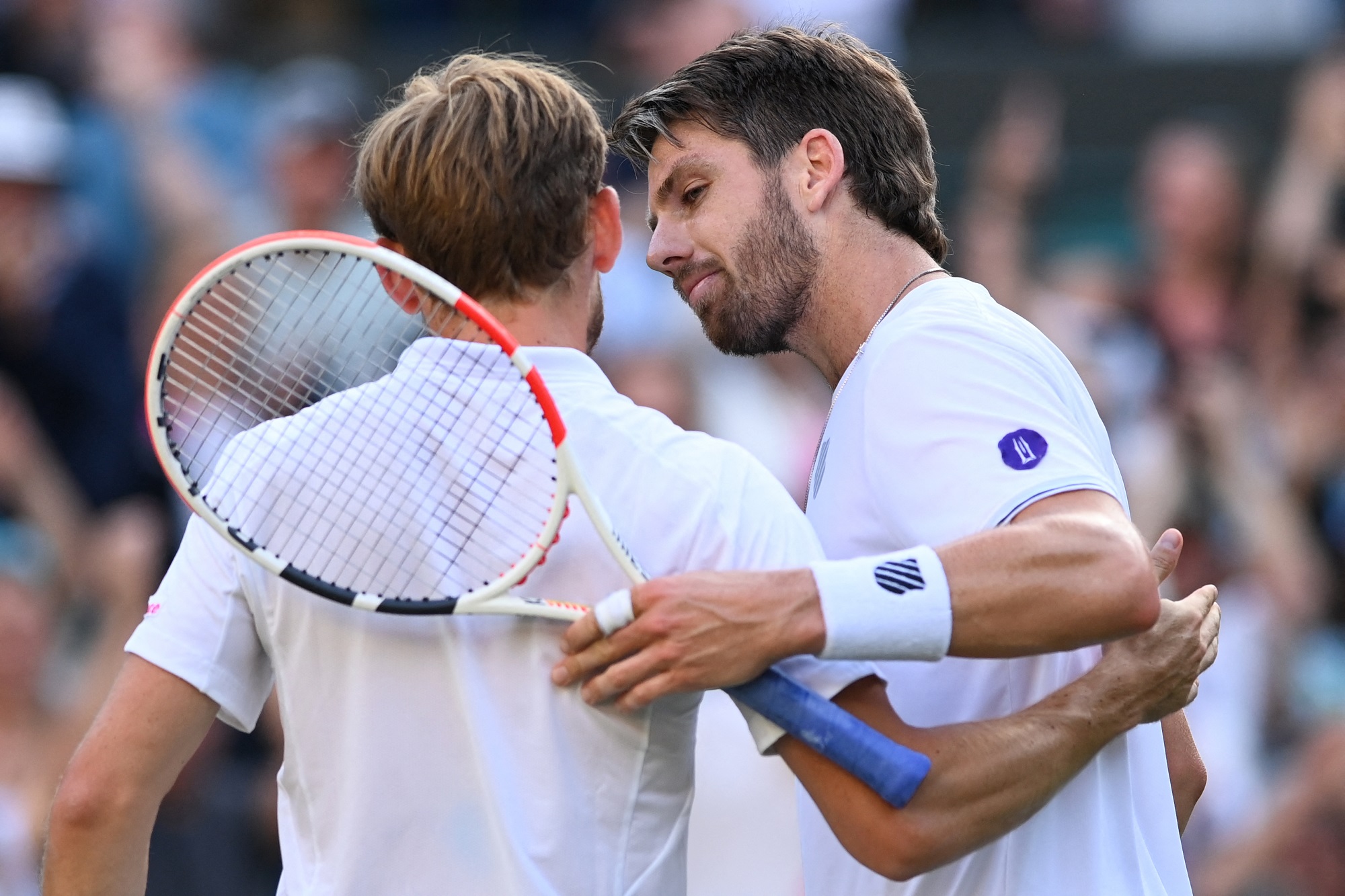 Trost vom Sieger: David Goffin unterlag im Viertelfinale von Wimbledon der britischen Nummer eins Cameron Norrie (Bild: Glyn Kirk/AFP)