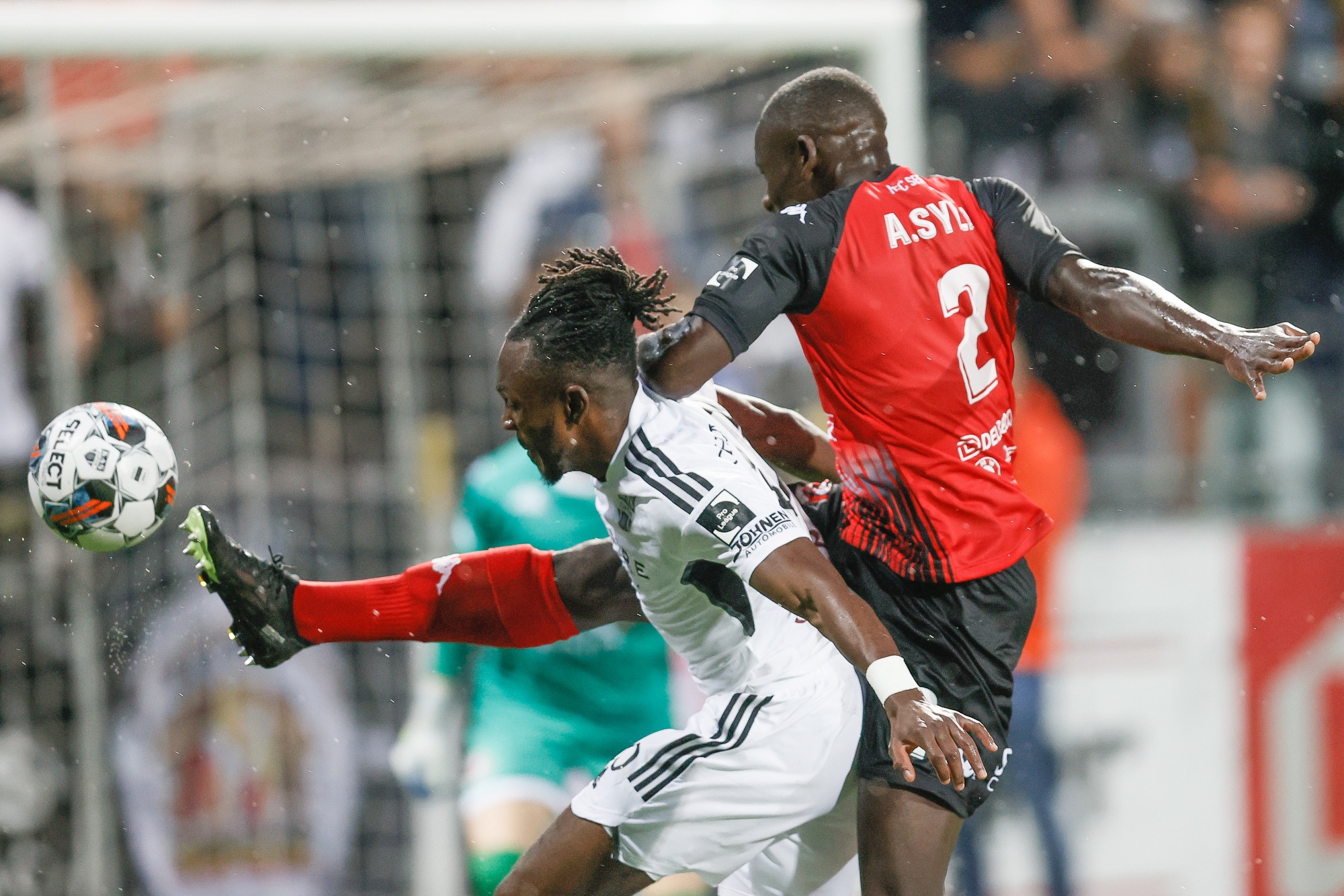 Eupen's Regan Charles-Cook and Seraing's Abdoulaye Sylla fight for the ball during a soccer match between KAS Eupen and RFC Seraing, Friday 19 August 2022 in Eupen, on day 5 of the 2022-2023 'Jupiler Pro League' first division of the Belgian championship. BELGA PHOTO BRUNO FAHY