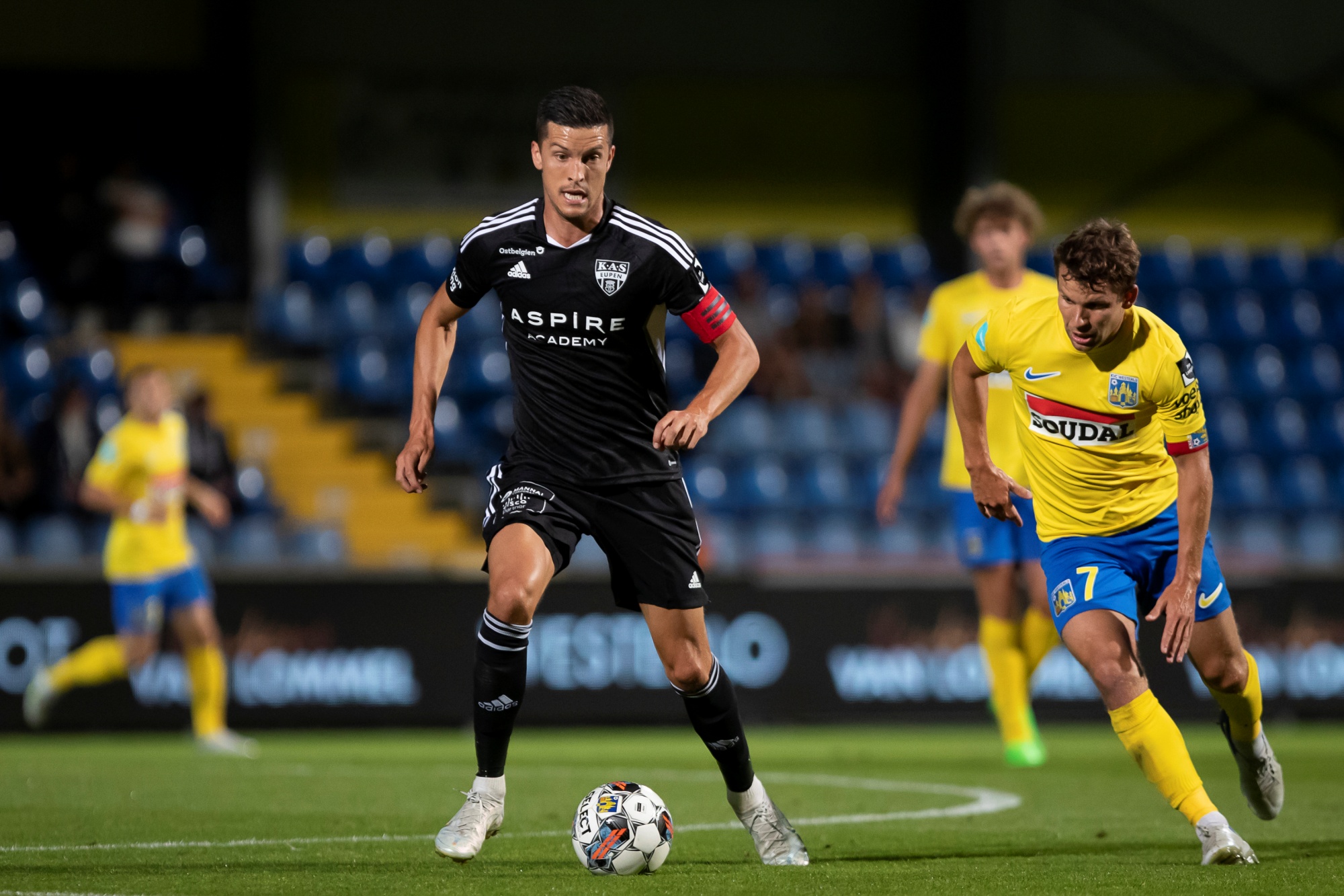 Eupen's Stef Peeters and Westerlo's Lukas Van Eeno pictured in action during a soccer match between KVC Westerlo and KAS Eupen, Sunday 28 August 2022 in Westerlo, on day 6 of the 2022-2023 'Jupiler Pro League' first division of the Belgian championship. BELGA PHOTO KRISTOF VAN ACCOM