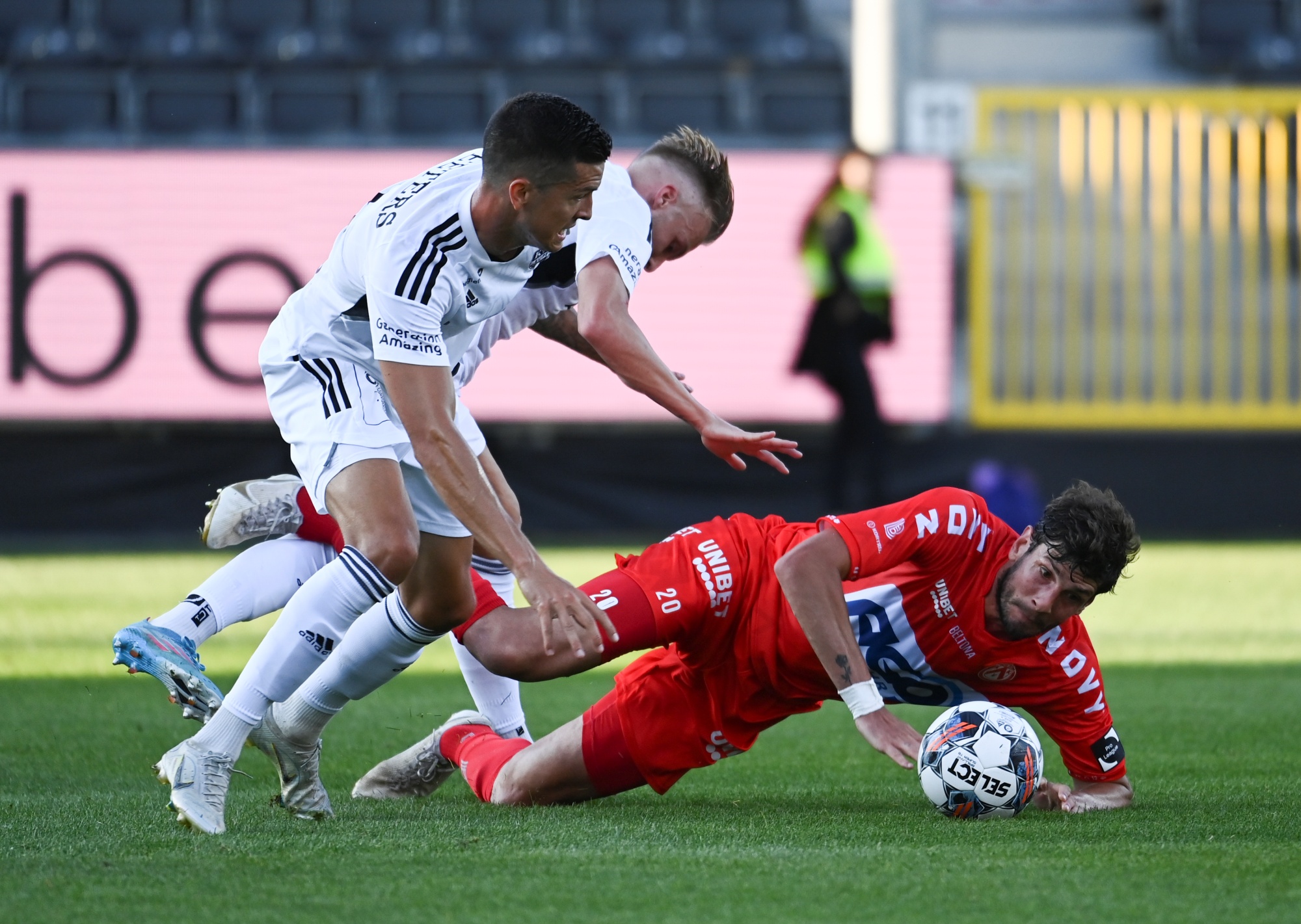 Eupen's Stef Peeters and Kortrijk's Felipe Avenatti fight for the ball during a soccer match between KAS Eupen and KV Kortrijk, Saturday 03 September 2022 in Eupen, on day 7 of the 2022-2023 'Jupiler Pro League' first division of the Belgian championship. BELGA PHOTO JOHN THYS