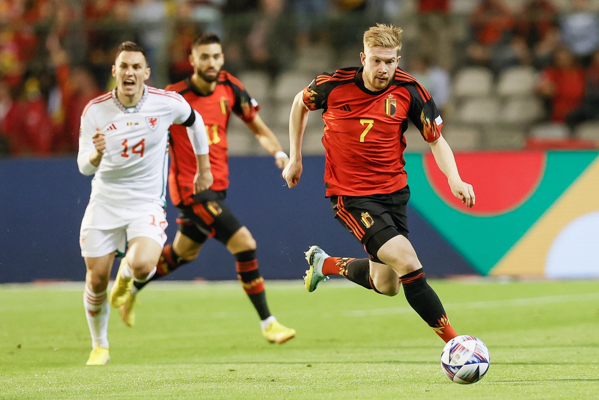 Welsh Connor Roberts and Belgium's Kevin De Bruyne fight for the ball during a soccer game between Belgian national team the Red Devils and Wales, Thursday 22 September 2022 in Brussels, game 5 (out of six) in the Nations League A group stage. BELGA PHOTO BRUNO FAHY