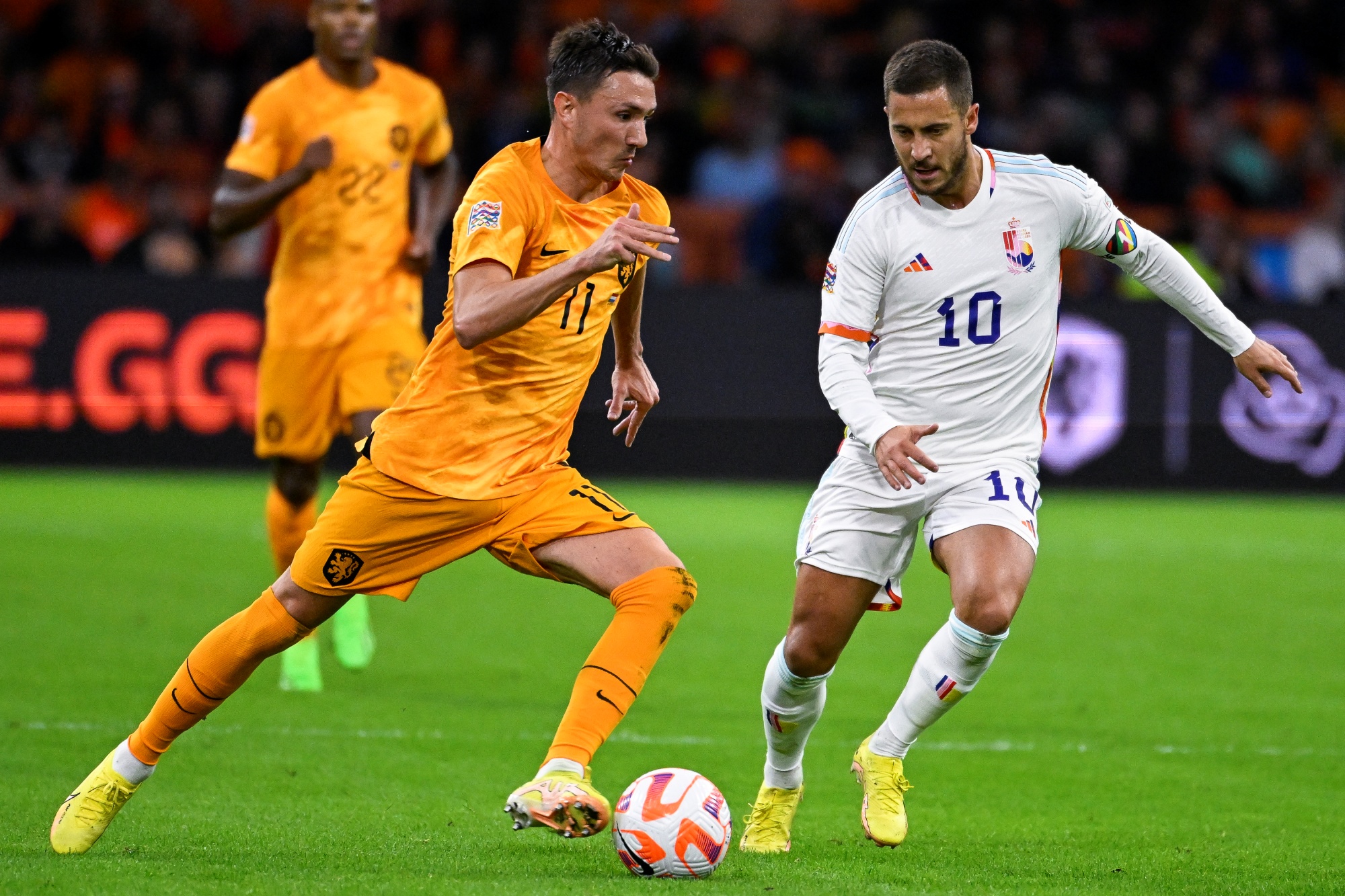 Netherlands' Steven Berghuis and Belgium's Eden Hazard fight for the ball during a soccer game between the Netherlands and Belgian national team the Red Devils, Sunday 25 September 2022 in Amsterdam, the Netherlands, the sixth and last game in the Nations League A group stage. BELGA PHOTO LAURIE DIEFFEMBACQ