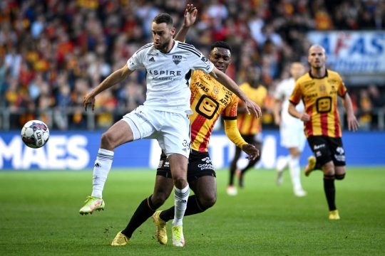 Eupen's Boris Lambert and Mechelen's Julien Ngoy pictured in action during a soccer match between KV Mechelen and KAS Eupen, Saturday 22 October 2022 in Mechelen, on day 14 of the 2022-2023 'Jupiler Pro League' first division of the Belgian championship. BELGA PHOTO DAVID STOCKMAN