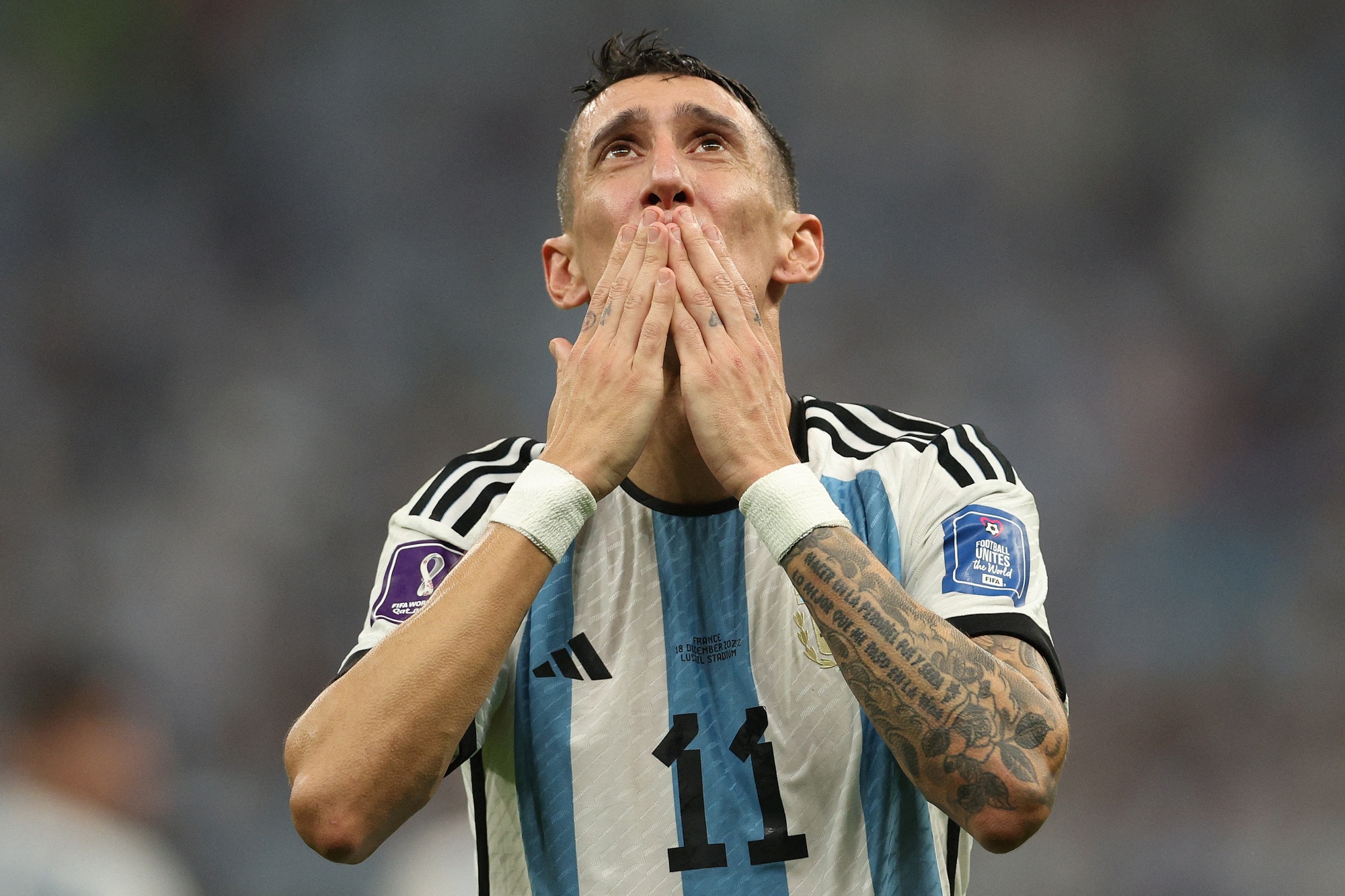 Argentina's midfielder #11 Angel Di Maria celebrates scoring his team's second goal during the Qatar 2022 World Cup final football match between Argentina and France at Lusail Stadium in Lusail, north of Doha on December 18, 2022. (Photo by Adrian DENNIS / AFP)