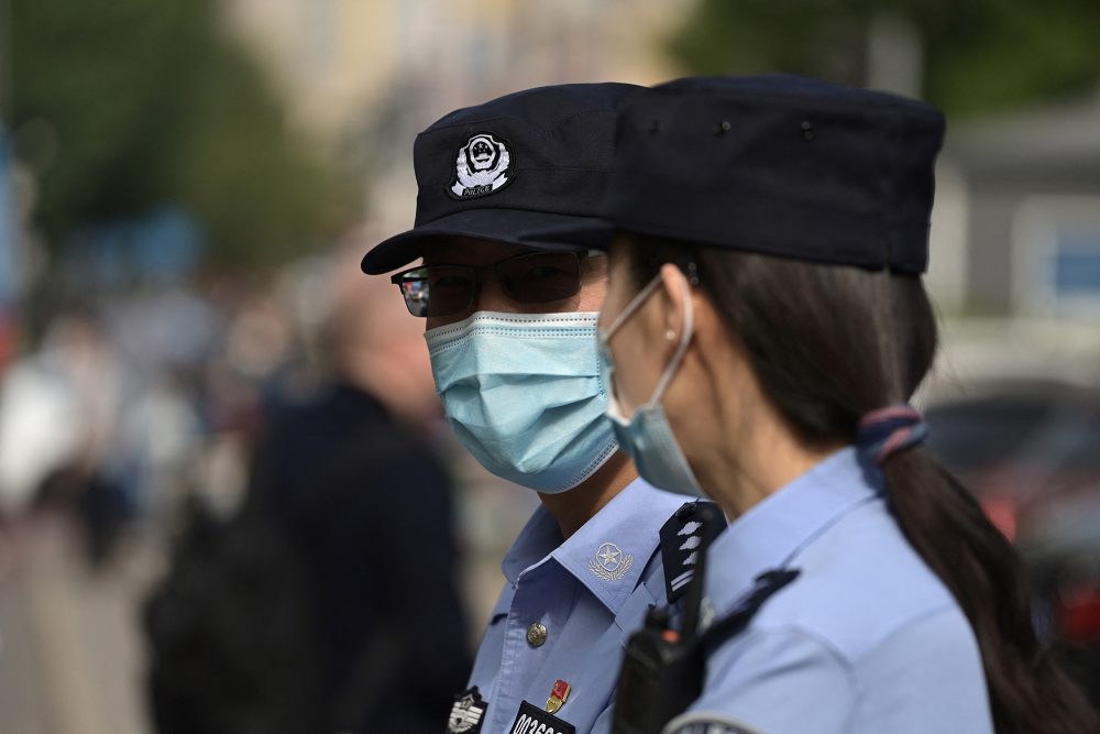 Chinesische Polizei (Bild: Nicolas Asfouri/AFP)