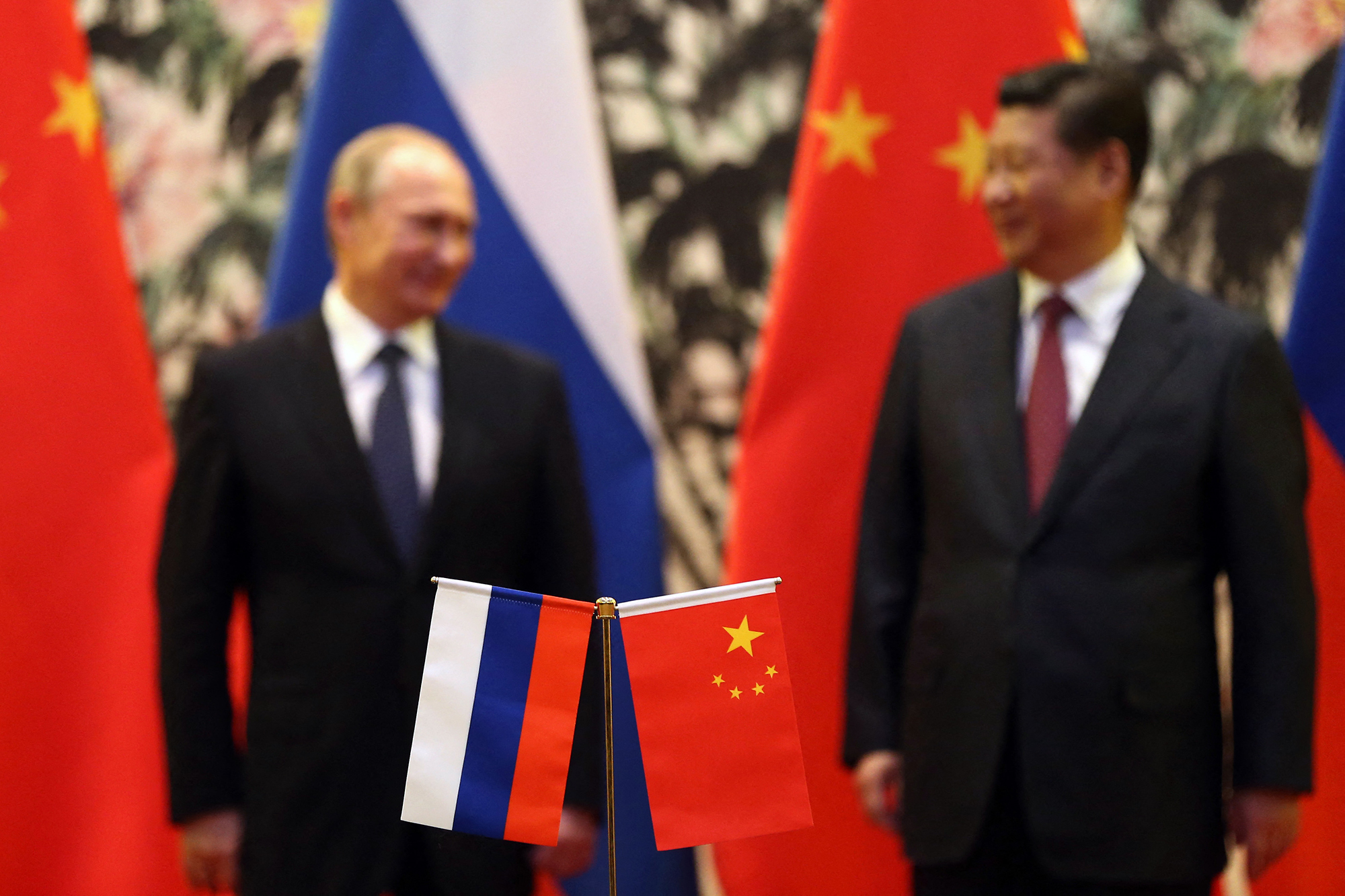 Russlands Präsident Wladimir Putin und Chinas Staatschef Xi Jinping (Archivbild: How Hwee Young/Pool/AFP)
