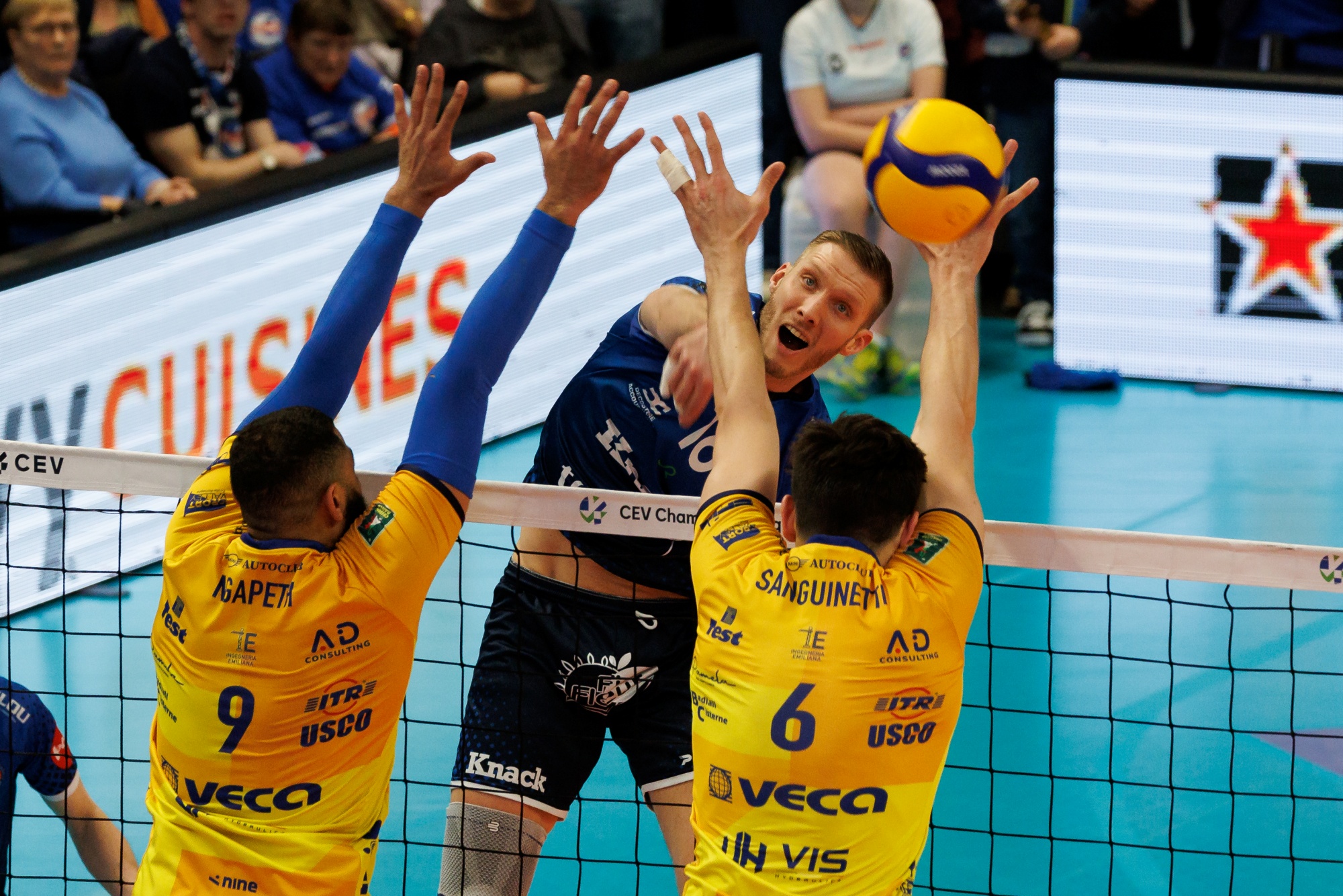 Modena's Earvin Ngapeth, Roeselare's Pablo Sergio Koukartsev and Modena's Giovanni Sanguinetti fight for the ball during a volleyball match between Knack Roeselare and Modena, second leg of the final of the men's CEV Cup, Wednesday 05 April 2023 in Roeselare. BELGA PHOTO KURT DESPLENTER
