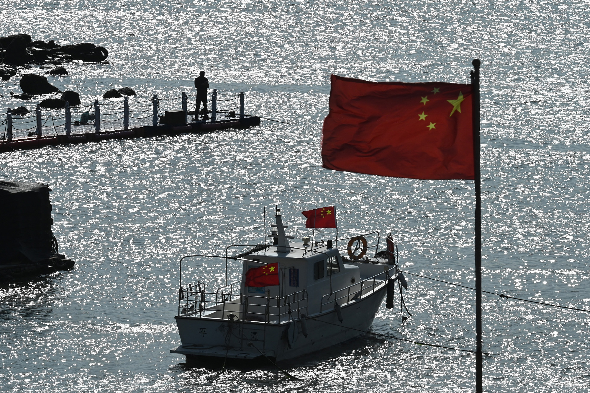 Chinesische Flagge (Bild: Greg Baker/AFP)