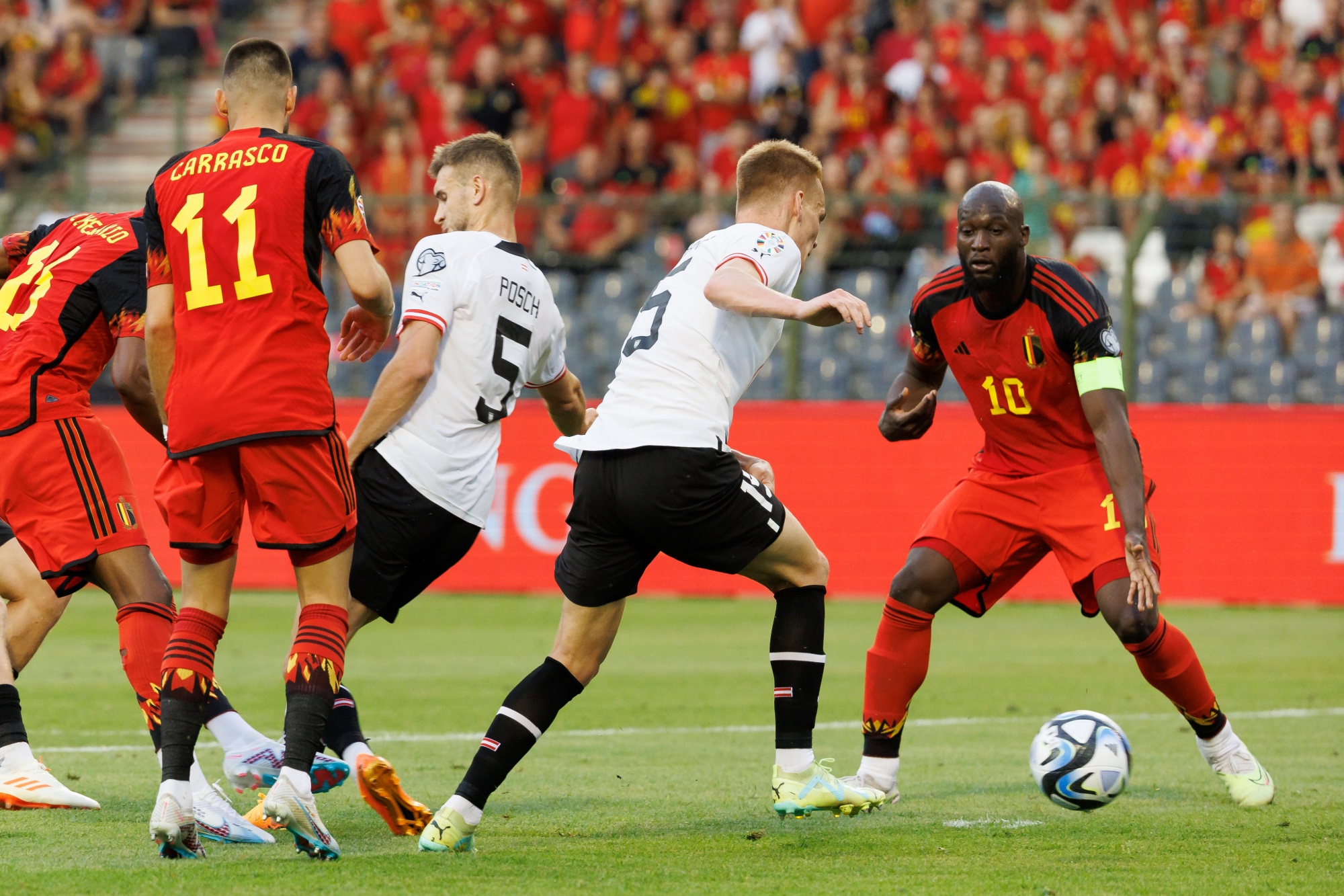 Austria's Stefan Posch and Belgium's Romelu Lukaku fight for the ball during a soccer game between Belgian national team Red Devils and Austria, Saturday 17 June 2023 in Brussels, the second (out of 8) qualification match for the Euro 2024 European Championships. BELGA PHOTO KURT DESPLENTER
