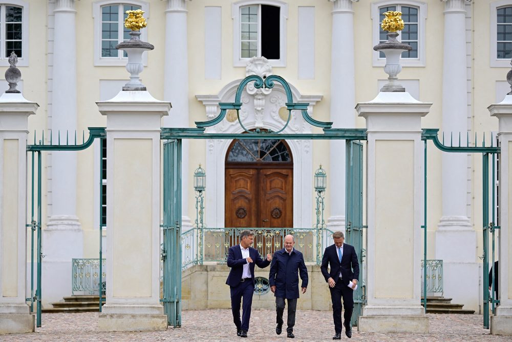 Robert Habeck, Olaf Scholz und Christian Lindner (Bild: John MacDougall/AFP)