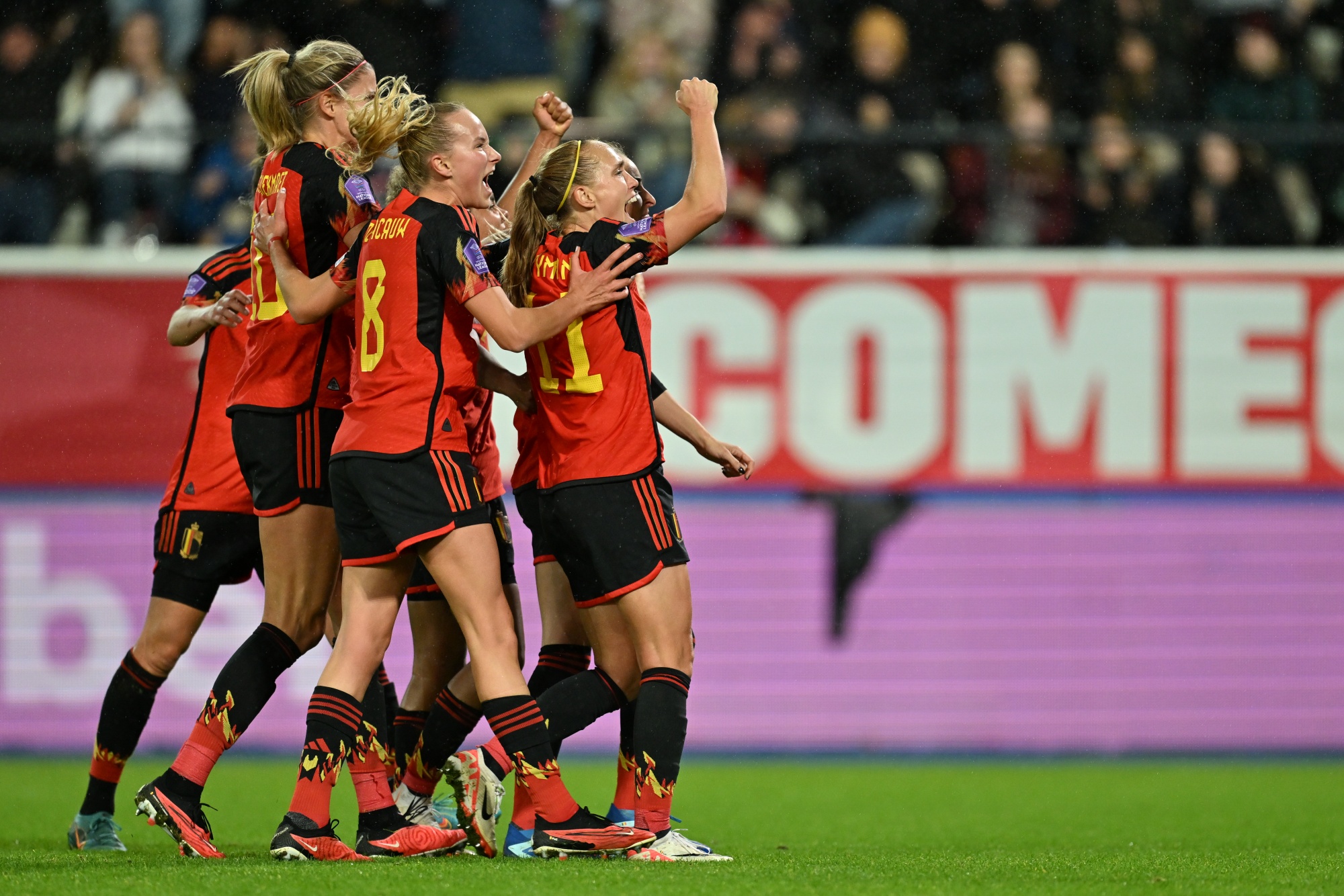 Belgium's Tessa Wullaert celebrates with teammates after scoring from penalty the 3-2 goal during a soccer match between Belgium's national women's team the Red Flames and England, game 4/6 in group A1 of the 2023-2024 UEFA Women's Nations League competition, on Tuesday 31 October 2023, in Heverlee. BELGA PHOTO DAVID CATRY
