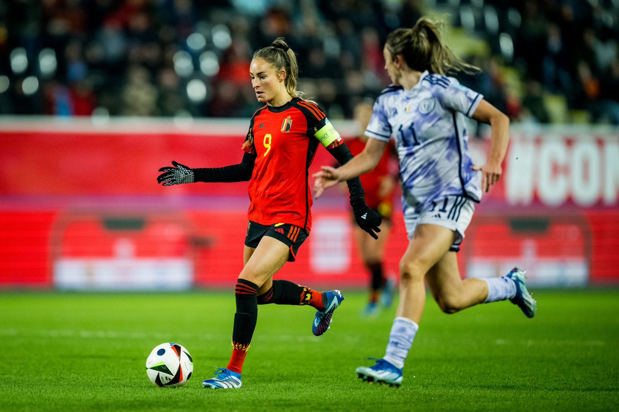 Belgium's Tessa Wullaert and Scotland's Lisa Evans fight for the ball during a soccer match between Belgium's national women's team the Red Flames and Scotland, game 5/6 in group A1 of the 2023-2024 UEFA Women's Nations League competition, on Friday 01 December 2023, in Heverlee. BELGA PHOTO JASPER JACOBS