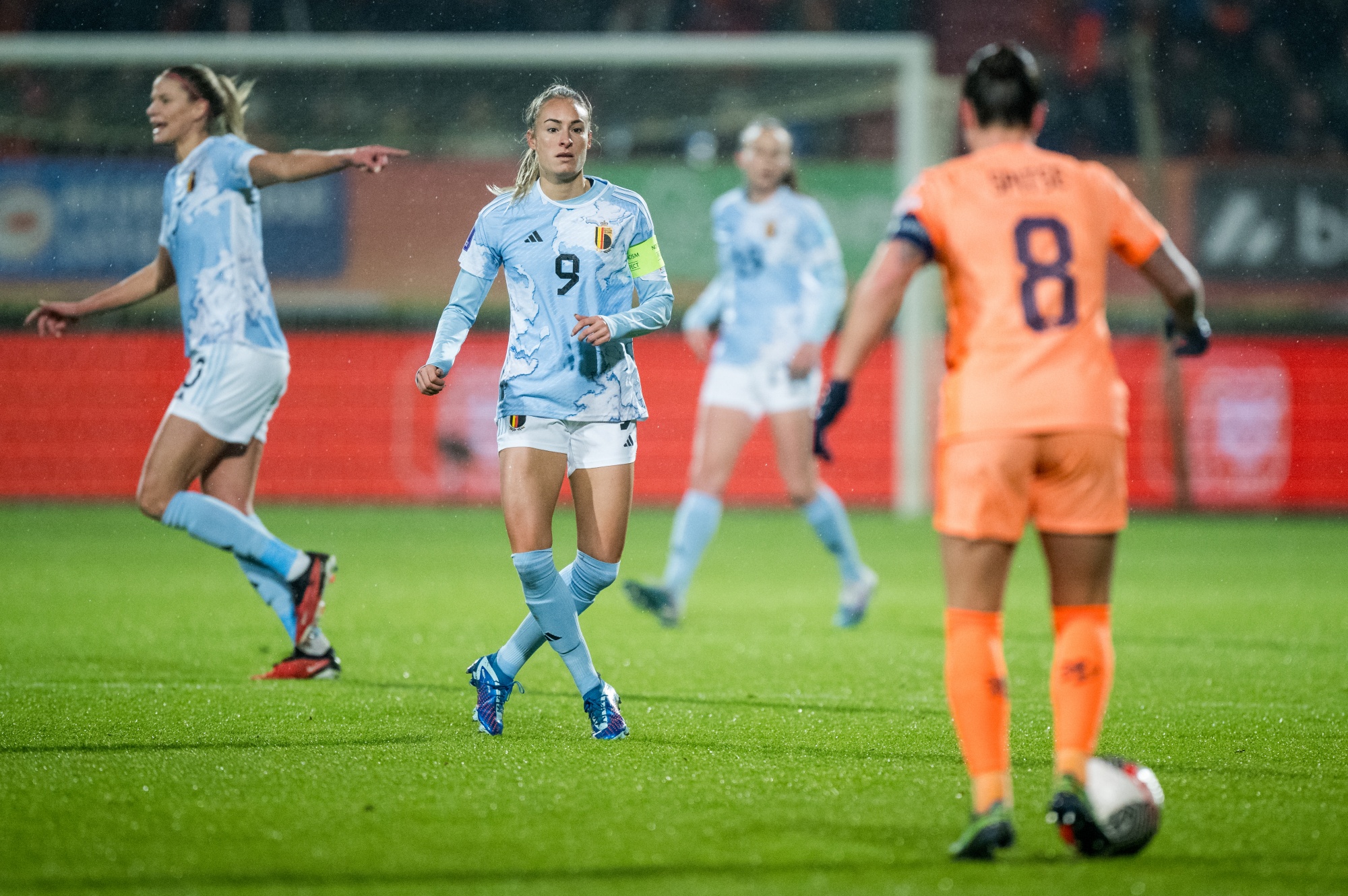 Belgium's Tessa Wullaert and Dutch Sherida Spitse (captain) fight for the ball during a soccer match between Belgium's national women's team the Red Flames and the Netherlands, the final game (6/6) in group A1 of the 2023-2024 UEFA Women's Nations League competition, on Tuesday 05 December 2023, in Tiblurg, the Netherlands. BELGA PHOTO JASPER JACOBS