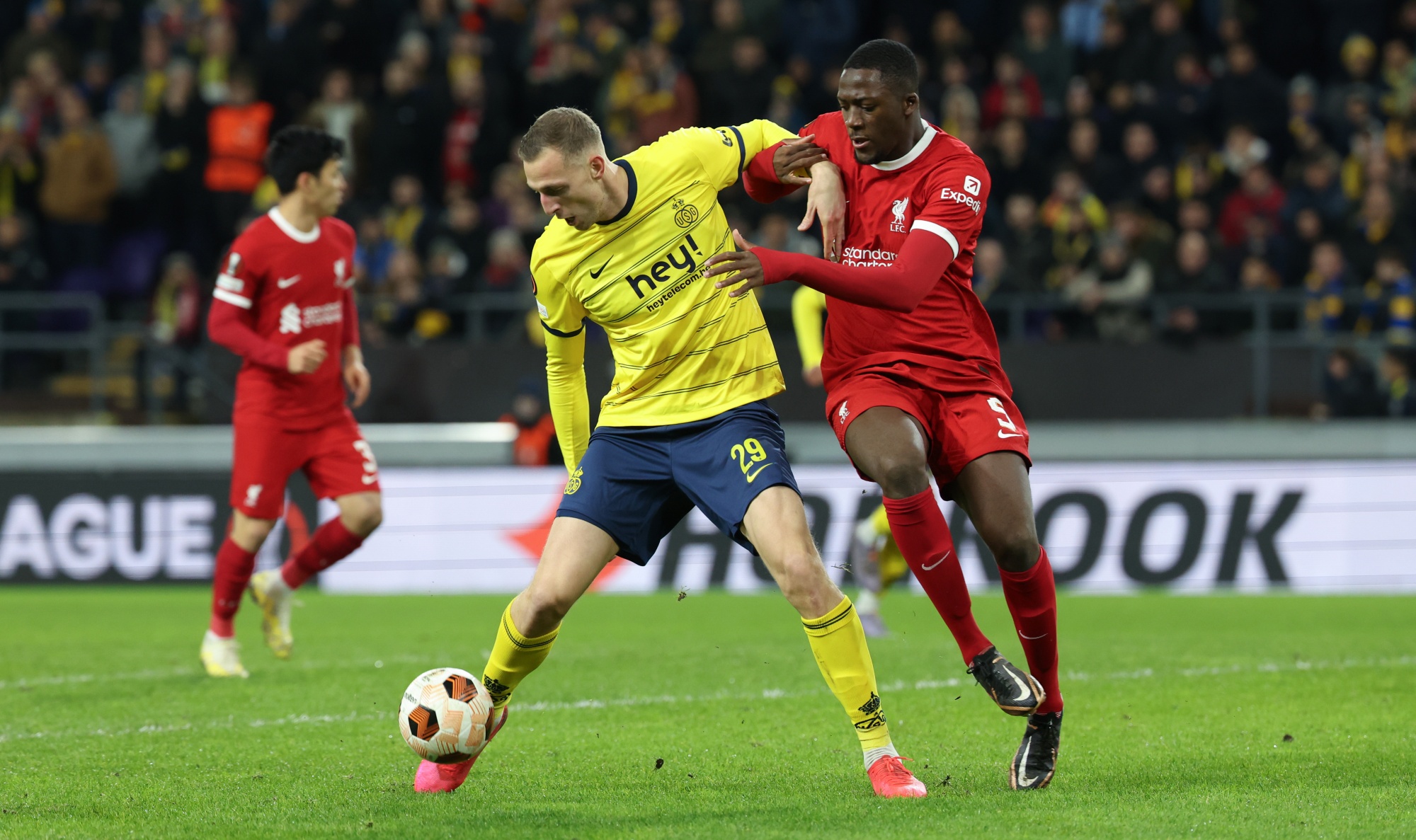 Union's Gustaf Nilsson and Liverpool's Ibrahima Konate fight for the ball during a game between Belgian soccer team Royale Union Saint Gilloise and English club Liverpool FC, on Thursday 14 December 2023 in Brussels, on the sixth and last day of the group phase of the UEFA Europa League competition, in group E. BELGA PHOTO VIRGINIE LEFOUR