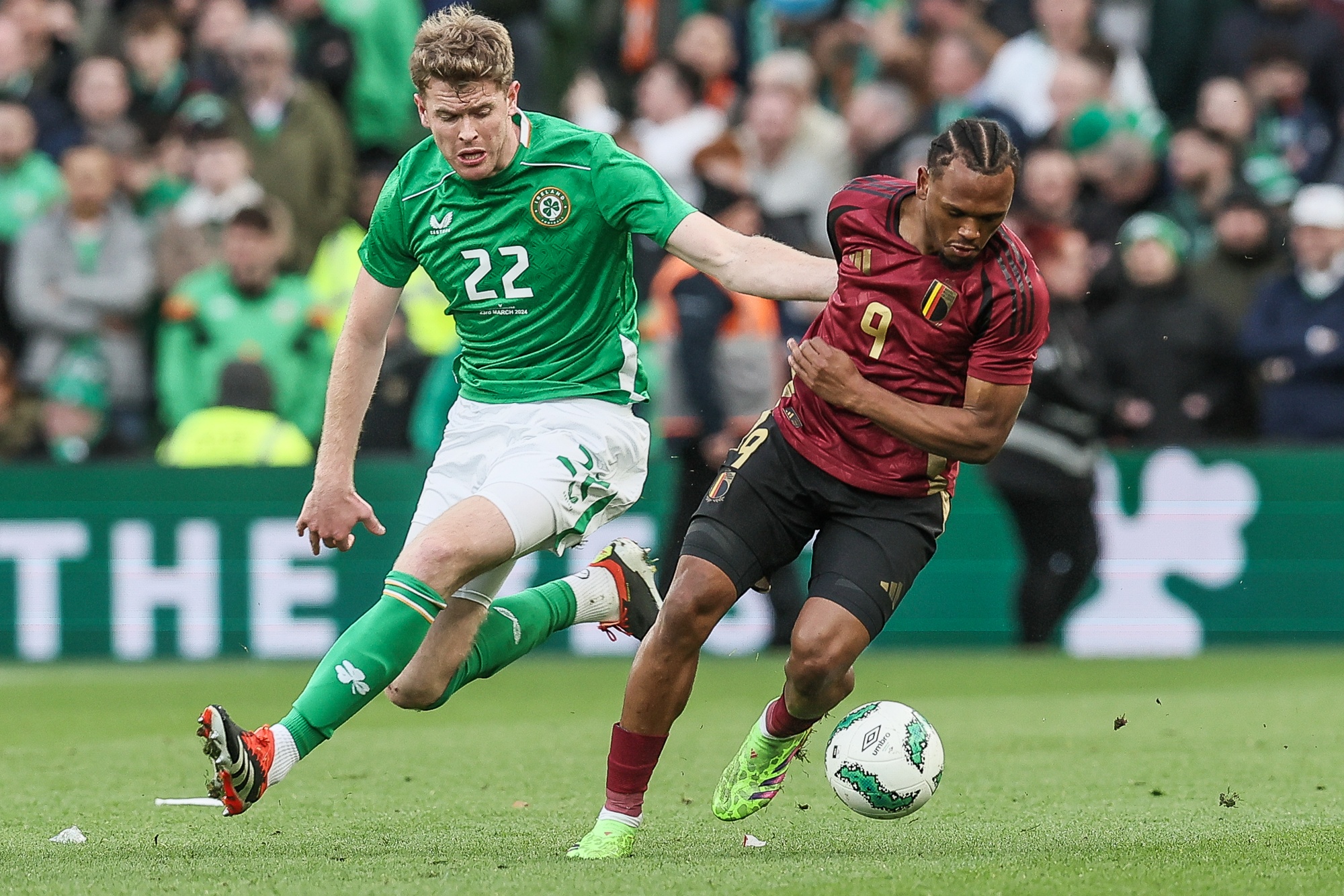Irish Nathan Collins and Belgium's Lois Openda fight for the ball during a friendly soccer match between Ireland and Belgian national team Red Devils, in Dublin, Ireland, Saturday 23 March 2024. The Red Devils play two friendly matches in preparation for the Euro 2024. BELGA PHOTO BRUNO FAHY