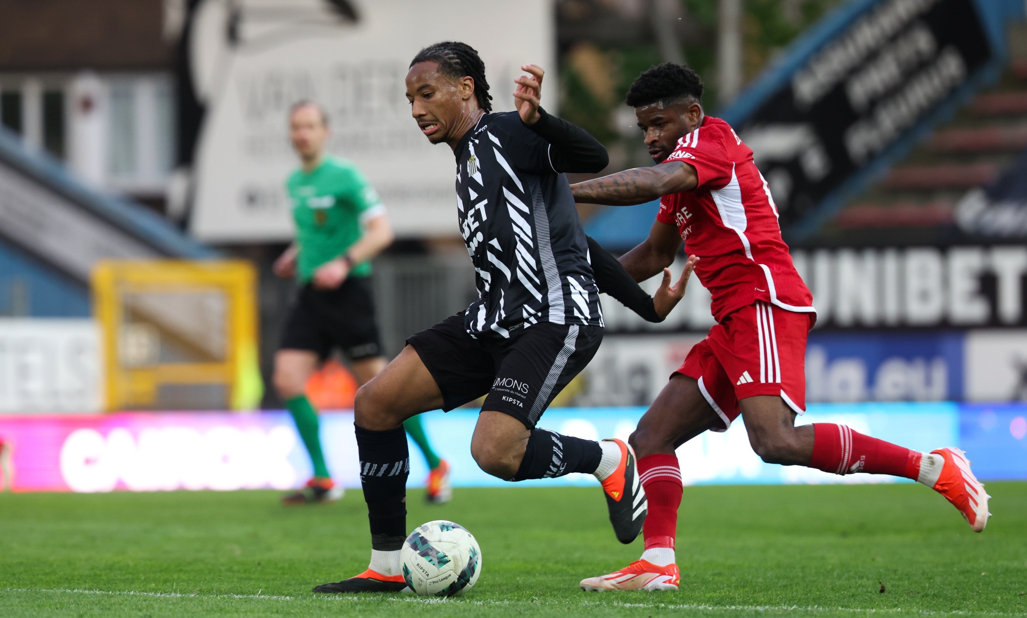 Charleroi's Etienne Camara and Eupen's Brandon Baiye fight for the ball during a soccer match between Sporting Charleroi and KAS Eupen, Sunday 21 April 2024 in Charleroi, on day 3/6 of the 2023-2024 'Jupiler Pro League - Relegation Play-offs. BELGA PHOTO VIRGINIE LEFOUR