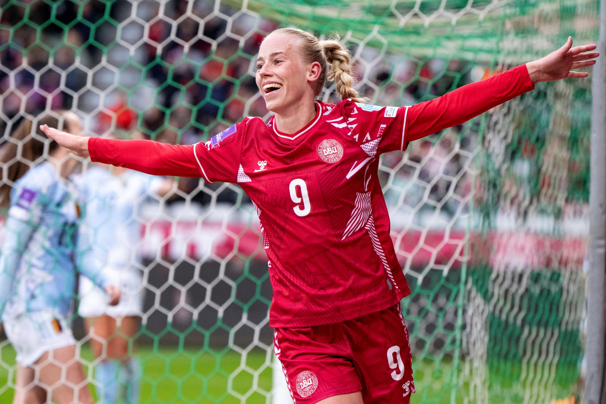 Danish Amalie Vangsgaard celebrates after scoring during a soccer game between Denmark and Belgium's Red Flames, on Tuesday 09 April 2024 in Viborg, Denmark, match 2/6 of the qualifications of the 2025 European Championships. BELGA PHOTO BO AMSTRUP ***BELGIUM ONLY***