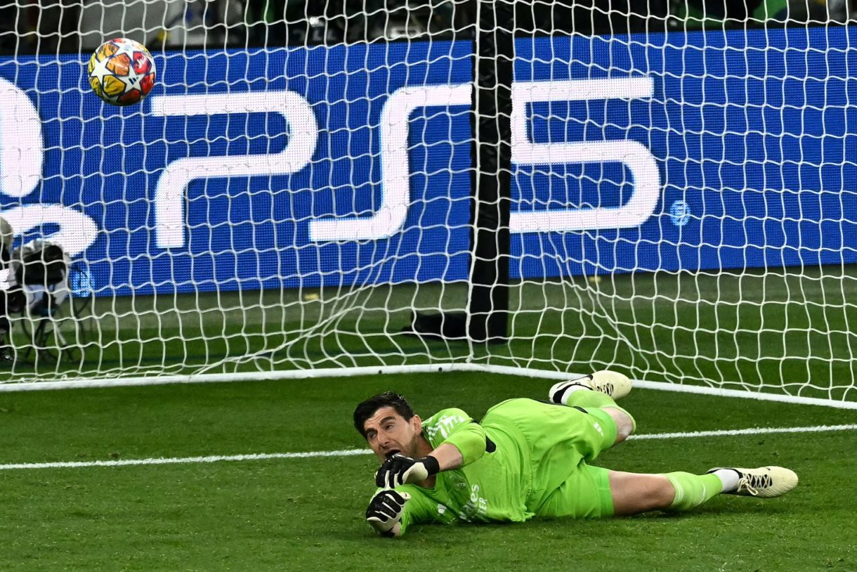 Real Madrid's Belgian goalkeeper #01 Thibaut Courtois makes a save during the UEFA Champions League final football match between Borussia Dortmund and Real Madrid, at Wembley stadium, in London, on June 1, 2024. Ben Stansall / AFP