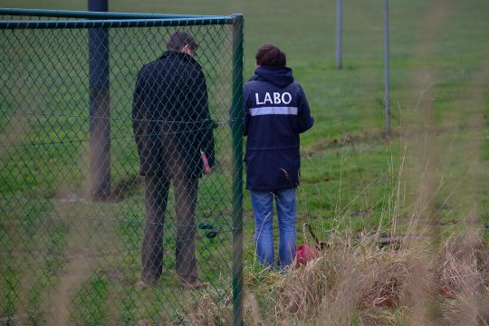 Ermittler nach einem Mord in Wommelgem 2014