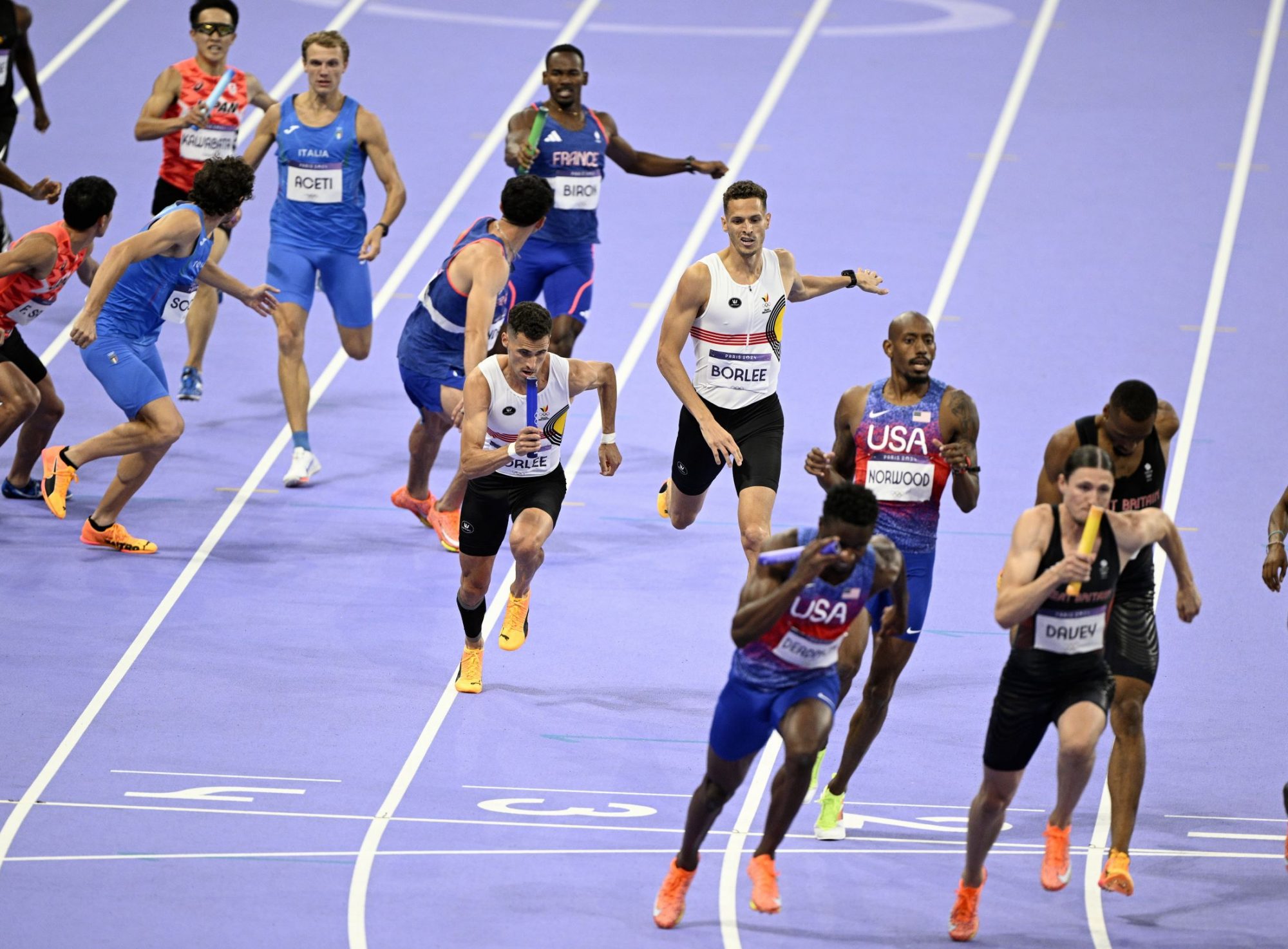 Belgian athlete Kevin Borlee and Belgian athlete Dylan Borlee pictured in action during the men's 4x400m relay final, at the athletics competition at the Paris 2024 Olympic Games, on Saturday 10 August 2024 in Paris, France. The Games of the XXXIII Olympiad are taking place in Paris from 26 July to 11 August. The Belgian delegation counts 165 athletes competing in 21 sports. BELGA PHOTO JASPER JACOBS