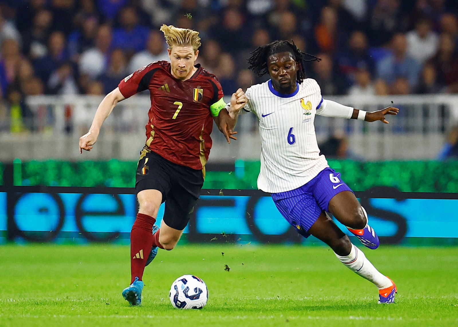 occer Football - Nations League - League A - Group 2 - France v Belgium - Groupama Stadium, Lyon, France - September 9, 2024 Belgium's Kevin De Bruyne in action with France's Manu Kone REUTERS/Sarah Meyssonnier