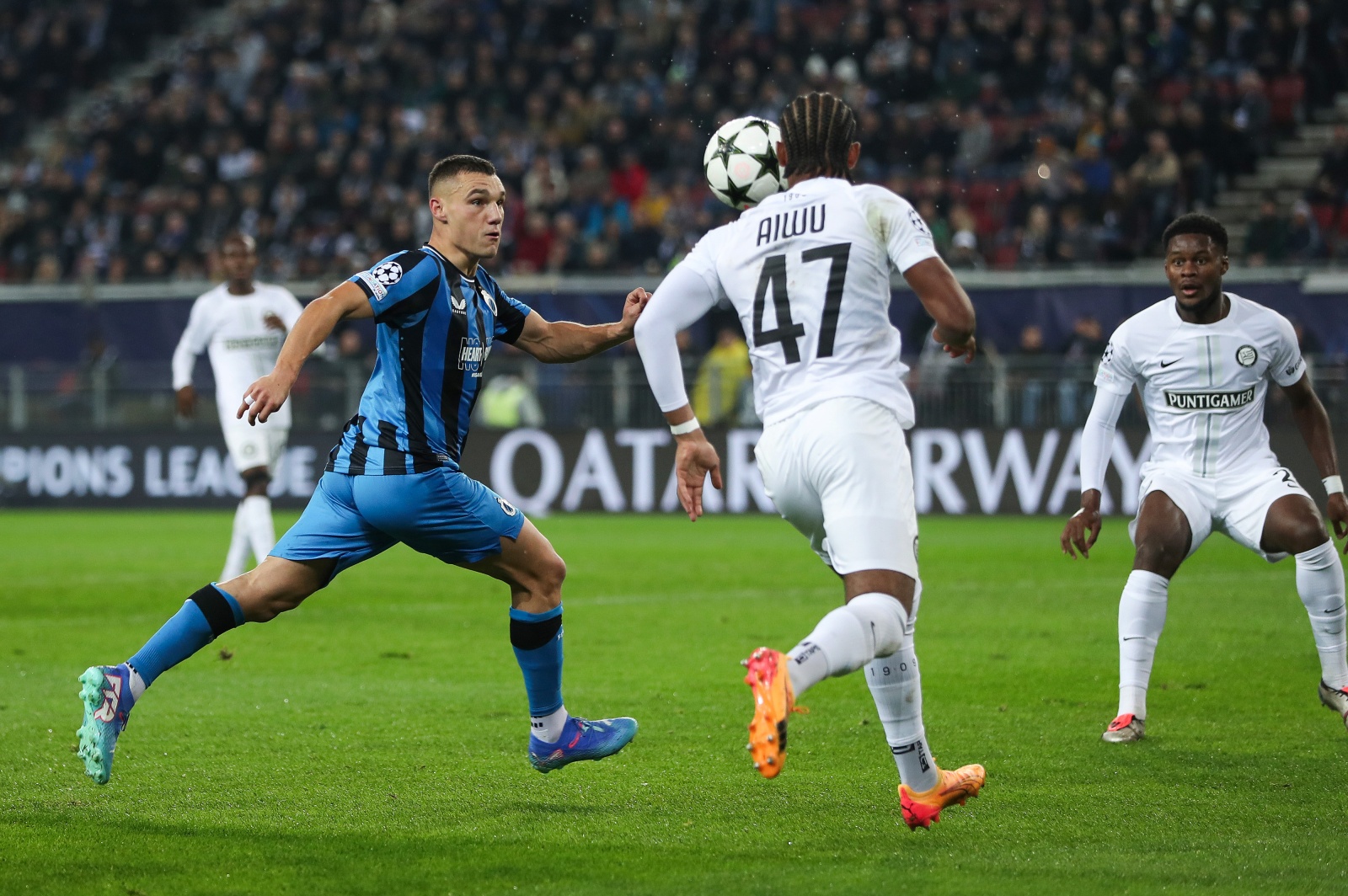 Ferran Jutgla of Club Brugge and Emanuel Aiwu fight for a ball during the UEFA Champions League 2024/25 League Phase MD2 match between SK Sturm Graz and Club Brugge at Worthersee Stadium in Klagenfurt, Austria on October 2, 2024. Photo: Sanjin Strukic/PIXSELL