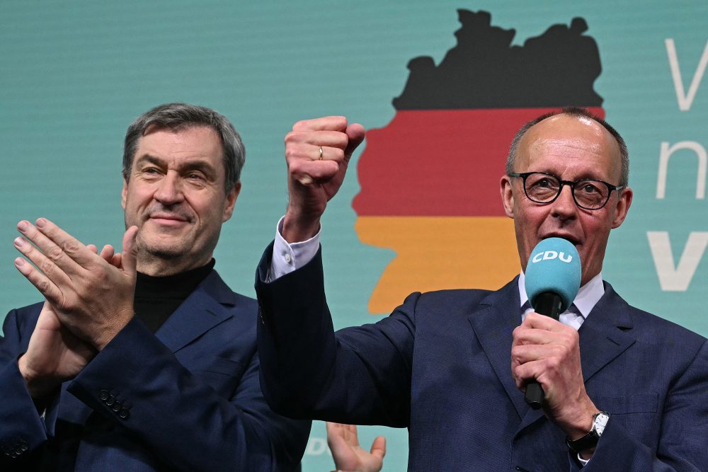 Markus Söder (CSU) und Friedrich Merz (CDU) feiern den Wahlsieg