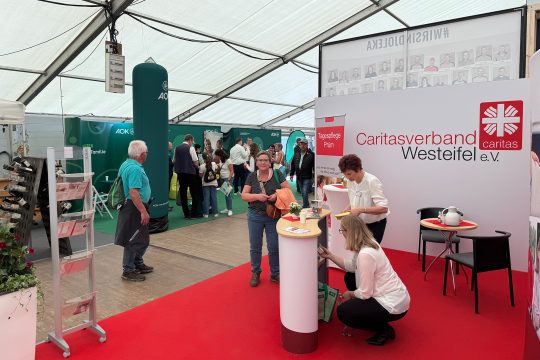 Caritas-Stand bei der GLS