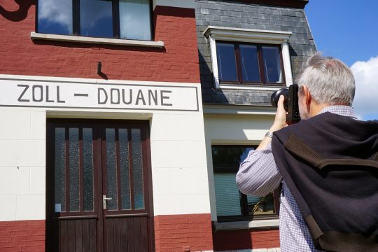 Der Fotograf Guy Focant bei der Arbeit