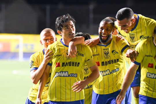 Jubelnde Spieler von Sint-Truiden